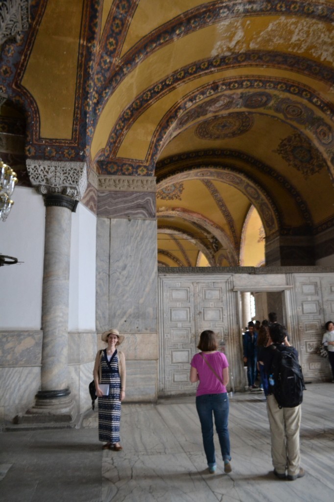 Gold mosaics adorn the ceilings, except the swathes where time and opportunistic visitors have nibbled them away.